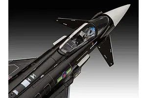 A close-up, high-angle view of a 1/144 scale plastic model of a black Eurofighter Typhoon fighter jet, showing the cockpit and fuselage details.