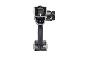 Front view of the Spektrum DX Rugged 12-channel RC transmitter featuring a grey and black protective casing and a steering wheel with a rubber tire grip.