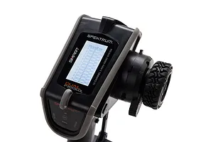 Spektrum DX Rugged 12-channel RC transmitter showing a monitor screen with channel bars, featuring a black and grey ruggedized design.
