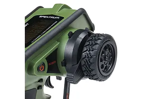 Close-up of the steering wheel and control panel of a green Spektrum DX Rugged 12-channel RC transmitter against a white background.