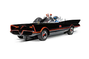 A 1/32 scale Scalextric Batmobile slot car in black with red trim, featuring a Batman figure in the cockpit, set against a white background.