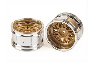 Two Tamiya 1.9-inch wide mesh RC car rims featuring a gold-colored center and a polished chrome outer barrel.