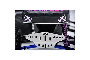 Close-up of a GPM branded stainless steel skid plate installed on the front of an Arrma RC vehicle with purple suspension springs.