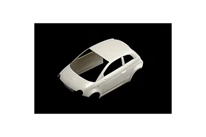 Unpainted white plastic car body shell for a 1/24 scale model kit of a Fiat 500 Abarth.