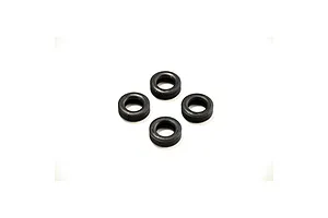 Four small black rubber model car tires arranged in a diamond pattern on a white background.