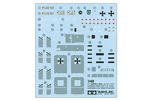 A decal sheet for the Tamiya 1/48 scale Leopard 2 A7V model kit, featuring various markings, numbers, and mesh patterns on a light blue backing paper.