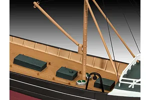 Close-up of the deck of a Northsea Fishing Trawler model kit showing the mast, rigging, and deck structures.