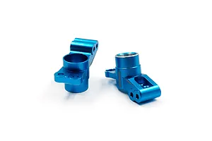 A pair of blue anodized aluminium rear hubs for RC cars by Yeah Racing, shown against a white background.