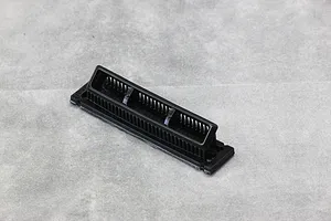 A black plastic Pandora RC A-Type turbo duct accessory for 1/10 scale RC car bodies, shown from an elevated angle on a grey surface.