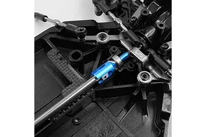 Close-up of a blue aluminium outdrive cup installed on an RC car chassis drivetrain assembly.