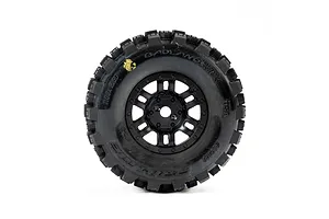 A single Pro-Line Badlands MX tyre mounted on a black Split Six rim, viewed from the front against a white background.