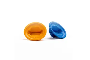 One orange and one blue Pro-Line gate marker sitting on a white background.