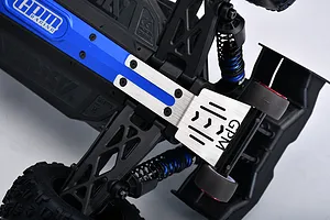Close-up of a GPM Racing stainless steel wheelie bar installed on an RC car chassis, featuring red aluminium wheel rims.