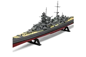 A fully assembled 1/600 scale plastic model of the Prinz Eugen heavy cruiser, displayed on a black plastic stand against a white background.