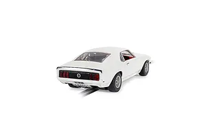 Rear three-quarter view of a white Scalextric 1/32 scale Ford Mustang slot car on a track.