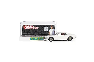 A 1/32 scale white Ford Mustang slot car from the Fast and Furious series, displayed in front of its branded plastic display case.