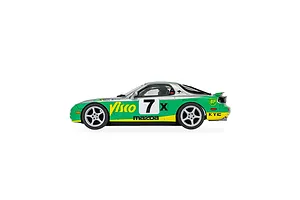 Side profile of a Scalextric 1/32 scale Mazda RX-7 FD slot car in green, silver, and yellow racing livery with number 7.