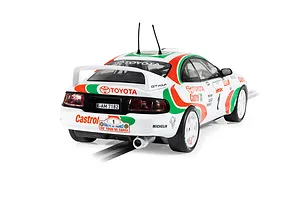 Rear three-quarter view of a Scalextric 1/32 scale Toyota Celica GT-Four rally slot car in white, green, and red Castrol livery.