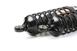 Two Rovan aluminium front adjustable shock absorbers in bronze and black finish, shown at an angle against a white background.