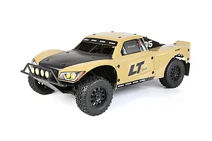 A 1/5 scale Rovan LT short course RC truck with a tan and black Dakar-style painted body shell, featuring off-road tires and a front light bar.