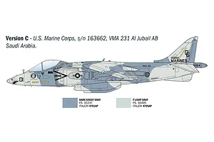 A side-profile illustration of a US Marine Corps AV-8B Harrier II jet, showing camouflage pattern and paint color references.