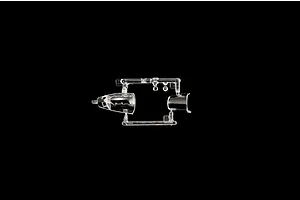A clear plastic sprue containing the cockpit canopy and another small part for an Italeri 1/72 scale AV-8B Harrier II model kit.