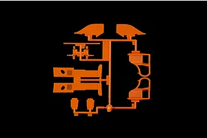 An orange plastic model kit sprue containing various car body parts for an Italeri 1/24 Porsche 956 model.