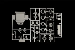 A grey plastic model kit sprue containing various car parts for an Italeri 1/24 Porsche 956 model.