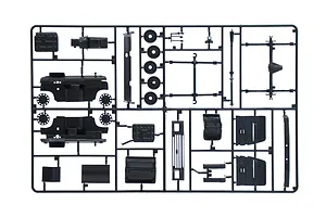 A black plastic sprue frame containing various unpainted model car parts for an Italeri 1/24 scale Ford Transit model kit.