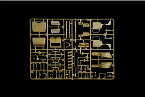 A tan plastic sprue containing various parts for a 1/35 scale model truck kit, including cab panels, suspension components, and engine parts.