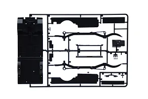 A black plastic model kit sprue containing chassis and floor pan components for a 1/24 scale model car.
