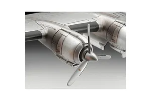 Close-up of the silver engine nacelle and propeller of a 1/144 scale Lockheed L-1049G Super Constellation model aircraft.