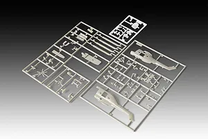 Unassembled plastic model kit sprues for a 1/144 scale Westland Puma helicopter, featuring grey plastic parts on frames against a gradient background.