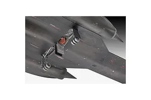 Close-up of the underside of a plastic model SR-71 Blackbird showing the landing gear and engine nacelles.