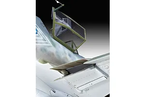 Close-up of the cockpit and wing root area of a 1/32 scale Messerschmitt Bf109G-10 model aircraft, showing the open canopy and camouflage paint scheme.