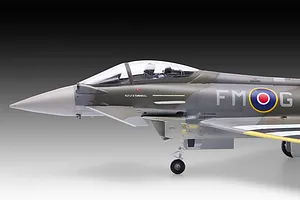 Side view of a 1/48 scale Revell Eurofighter Typhoon plastic model kit, showing the cockpit, nose, and fuselage markings.