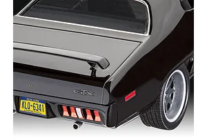 Rear view of a black 1/24 scale model of a 1971 Plymouth GTX with a New York license plate.