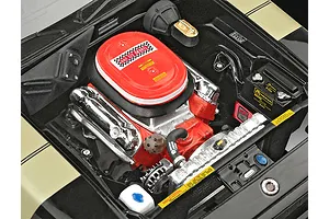 A detailed top-down view of the engine bay of a 1/24 scale model 1971 Plymouth GTX, featuring a red 440 Six Barrel air cleaner and chrome valve covers.
