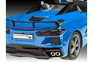 Rear view of a blue Revell 1/25 scale Corvette C8 Cabriolet plastic model car showing the spoiler, taillights, and exhaust pipes.