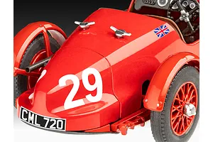Close-up of a red Revell 1/32 scale Aston Martin Ulster model car with number 29 and a British flag decal on the hood.