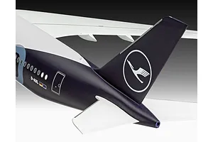 Close-up of the tail section of a Revell 1/144 scale Lufthansa Airbus A350-900 model aircraft, showing the blue tail fin with the Lufthansa crane logo.