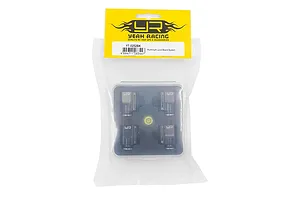 Yeah Racing Aluminium Level Board System (YT-0252BK) in original retail packaging, featuring four black metal leveling blocks and a small spirit level.