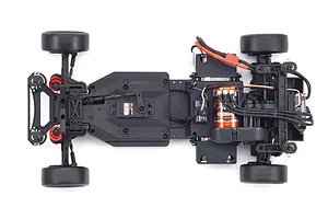 Top-down view of the Kyosho Fazer D2 RC drift car chassis showing the motor, servo, and drivetrain components on a white background.