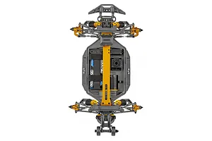 Top-down view of the Team Associated Rival MT10 Factory Team chassis showing the central gold anodized brace, battery, motor, and suspension components.