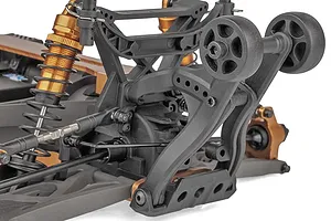 Close-up of the rear suspension and wheelie bar assembly on a Team Associated Rival MT10 RC monster truck chassis.