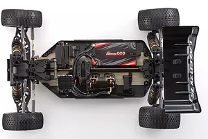 Top-down view of a Kyosho Lazer ZX7.5 1/10 scale 4WD RC buggy chassis, fully assembled with electronics, motor, and battery installed.