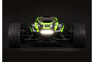 Front view of a Traxxas RC truck with a bright, illuminated double row LED light bar mounted on the front bumper against a dark background.
