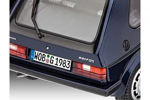 Close-up of the rear of a dark blue 1/24 scale model VW Golf GTI, showing the license plate, taillights, and rear window wiper.