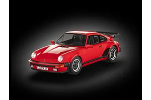 A studio shot of a red 1975 Porsche 911 Turbo plastic model car against a dark gradient background.
