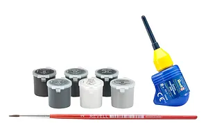 A set of six small Revell paint pots, a bottle of Contacta Professional Mini glue, and a red paint brush for model building.
